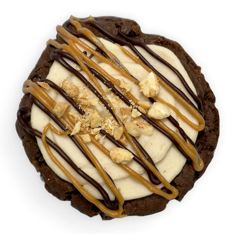 Chocolate peanut butter dream loaded cookie with peanut butter buttercream and chocolate ganache