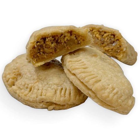 Multiple gluten-free chorizo sunrise hand pies filled with eggs and vegetables