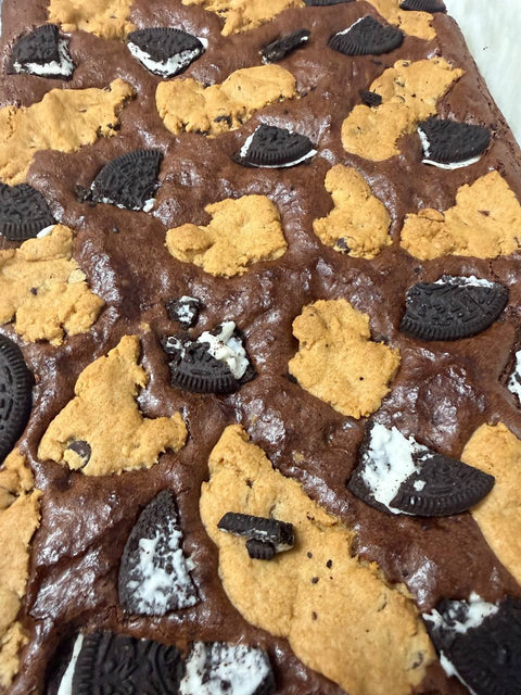 Uncut slab of gluten-free cookies and cream brownie before slicing
