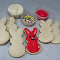 Gluten-free Easter sugar cookie decorating kit with bunny-shaped cookies, icing, and colorful sprinkles from Sinful Confections Portland
