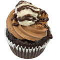 gluten free german chocolate cupcake with dairy free coconut almond frosting and chocolate drizzle