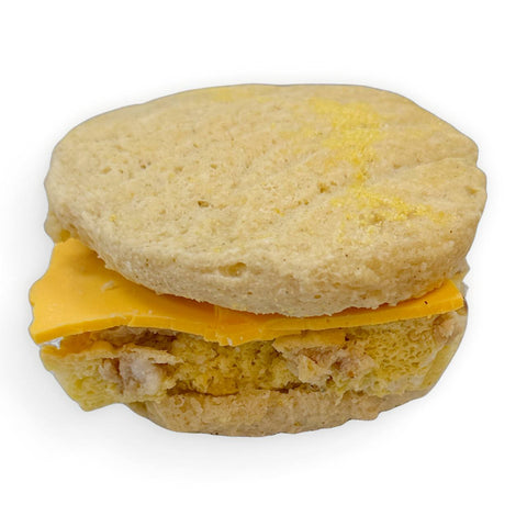 Gluten-free bacon egg and cheese sandwich made with a house-made bun and dairy-free cheese