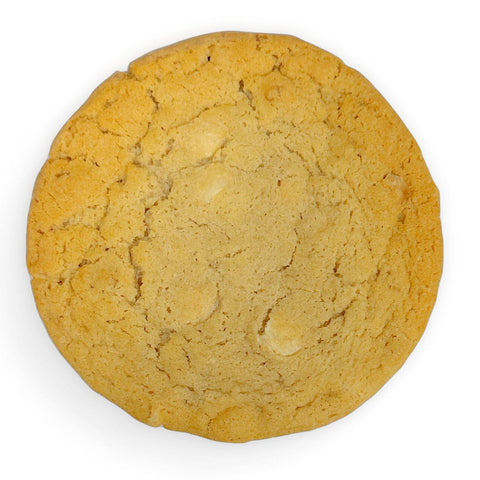 Gluten-free vegan white chocolate chip cookie from Sinful Confections bakery, soft baked and dairy-free with creamy white chocolate chips