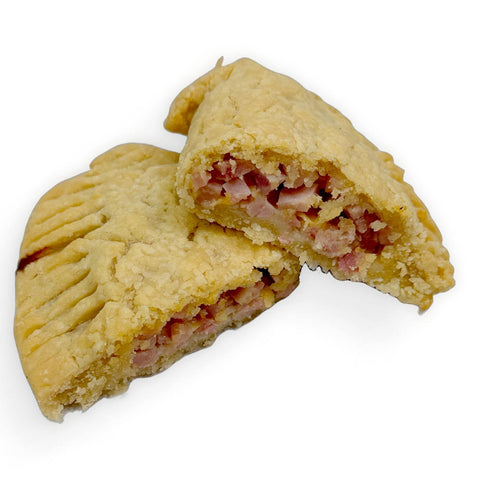 Gluten-free ham and cheese hand pie baked to a golden flaky crust