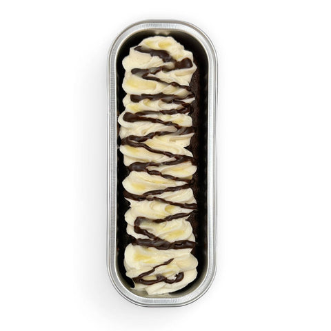 Salted Caramel Loaded Cake from Sinful Confections gluten-free dairy-free vegan bakery Portland Oregon with buttercream frosting and caramel drizzle