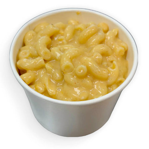 Single-serve mac and cheese cup made gluten free, dairy free and vegan, featuring creamy cheese and soft noodles.
