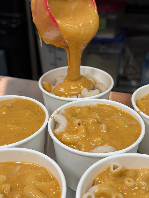 Vegan mac and cheese cup with gluten free noodles and dairy free creamy cheese sauce.